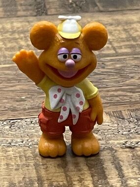 Fozzie Bear character figure from the Disney Junior Muppet Babies series